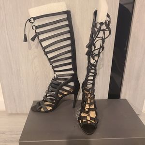 Lace up black leather sandals